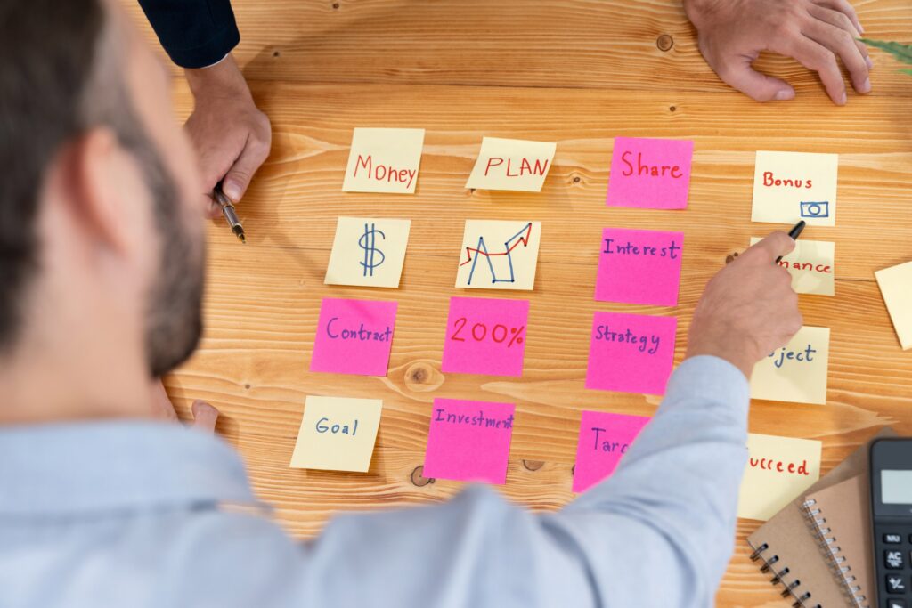 Business team gather on table, brainstorming and writing creative idea